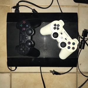 PS3 with two controllers and games